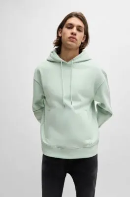 Cotton-terry all-gender hoodie in a relaxed fit