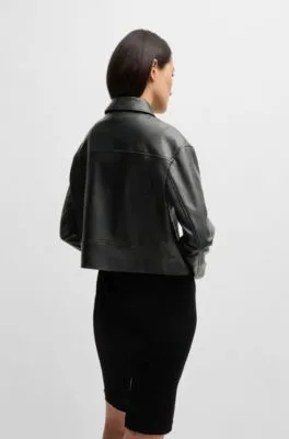 Faux-leather biker-style jacket with signature trims