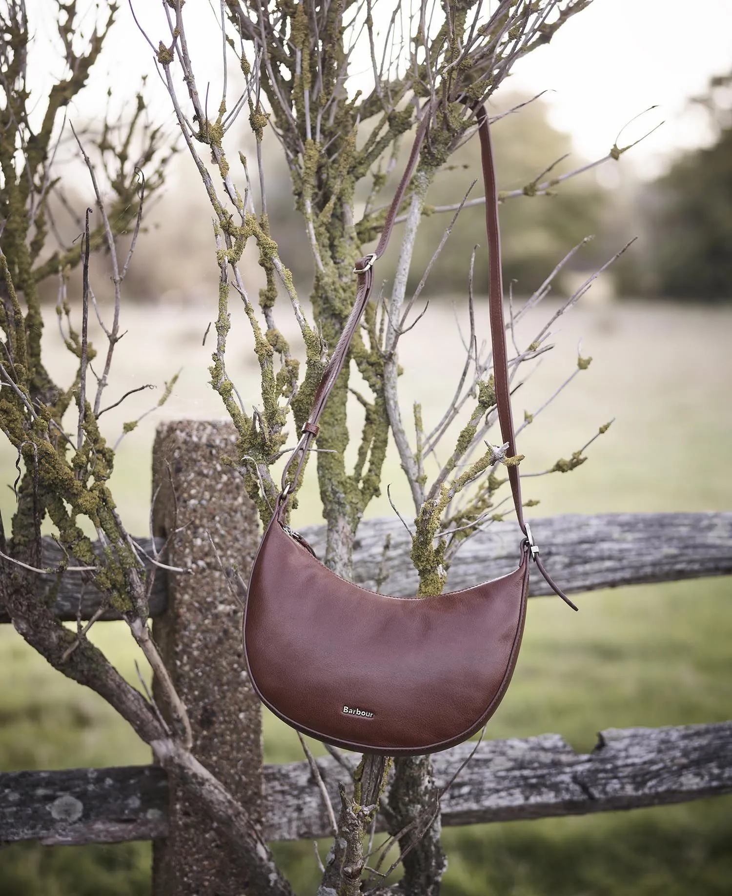  Laire Leather Half-Moon Bag     