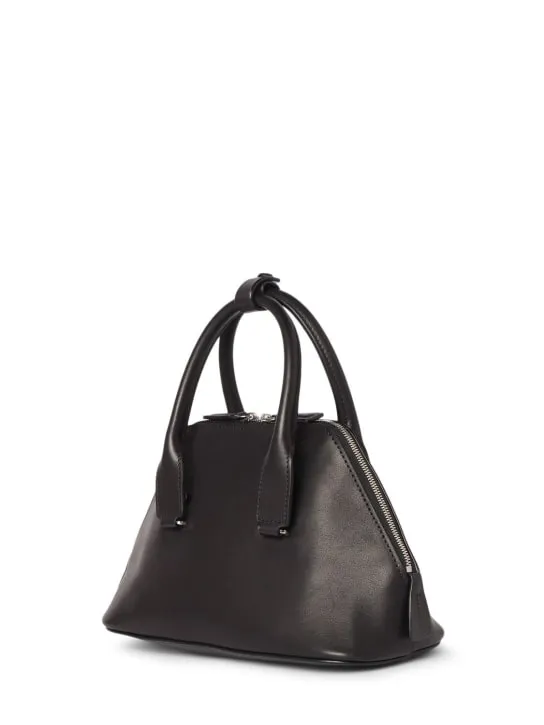 The Row   Mini Devon saddle leather top handle bag 