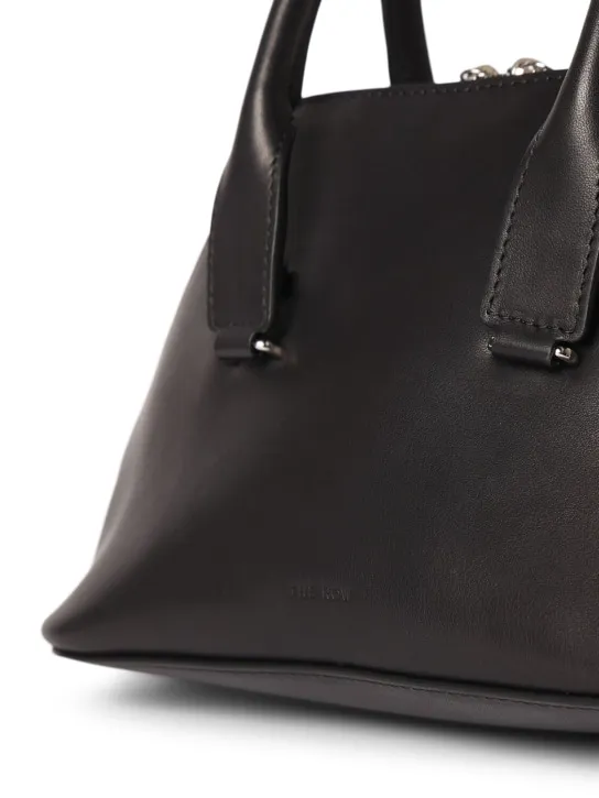 The Row   Mini Devon saddle leather top handle bag 